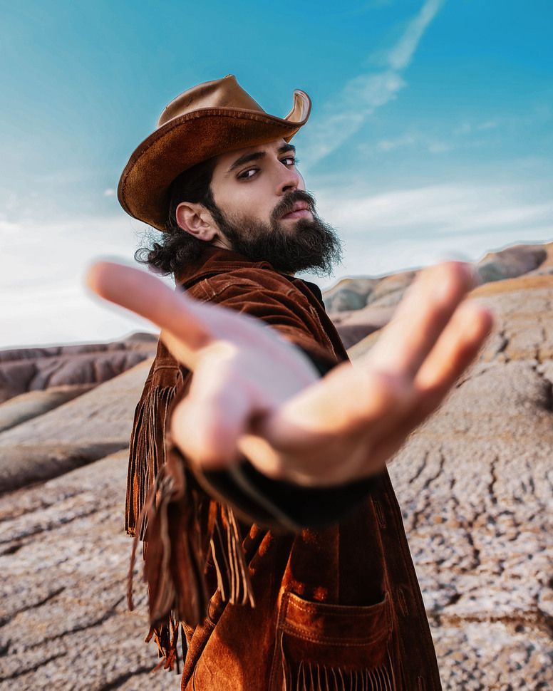 fashion photo of a man in stylish outfit in Dubai desert