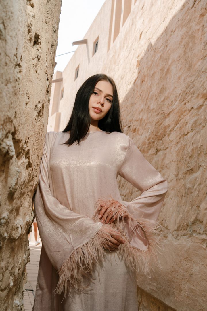 Model close-up emphasizing expression and makeup