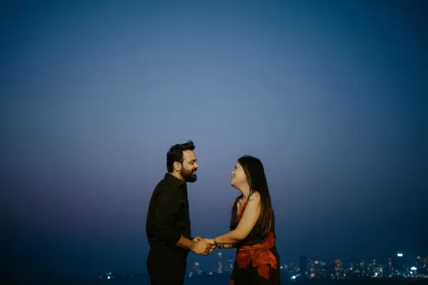 Couple holding hands during a proposal photoshoot in Dubai