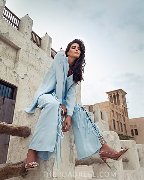 a stylish girl in Al Seef during the day, perfect for a trendy photoshoot in Dubai