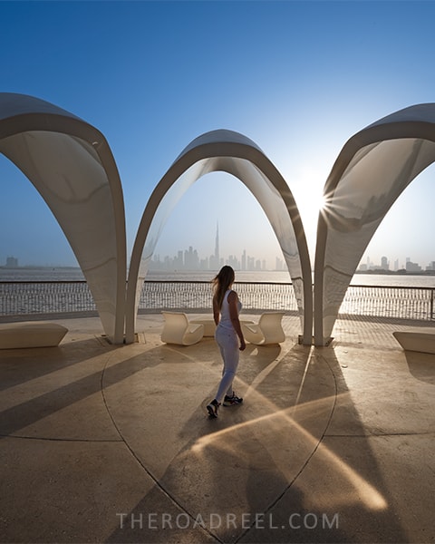 a photo from a woman with city view in the morning at Dubai Creek Harbor
